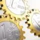 Pièces d'un euro en forme de rouages dorés alignés