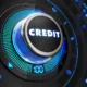 Bouton rotatif lumineux bleu marqué Credit sur une console noire