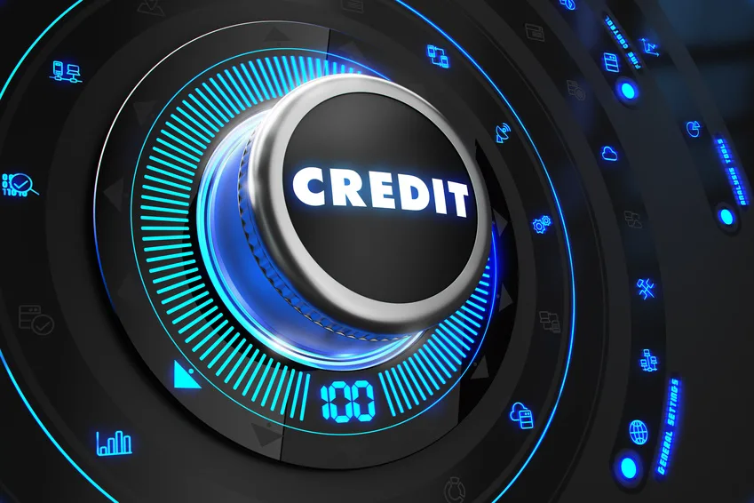 Credit Controller on Black Control Console. Bouton rotatif lumineux bleu marqué Credit sur une console noire